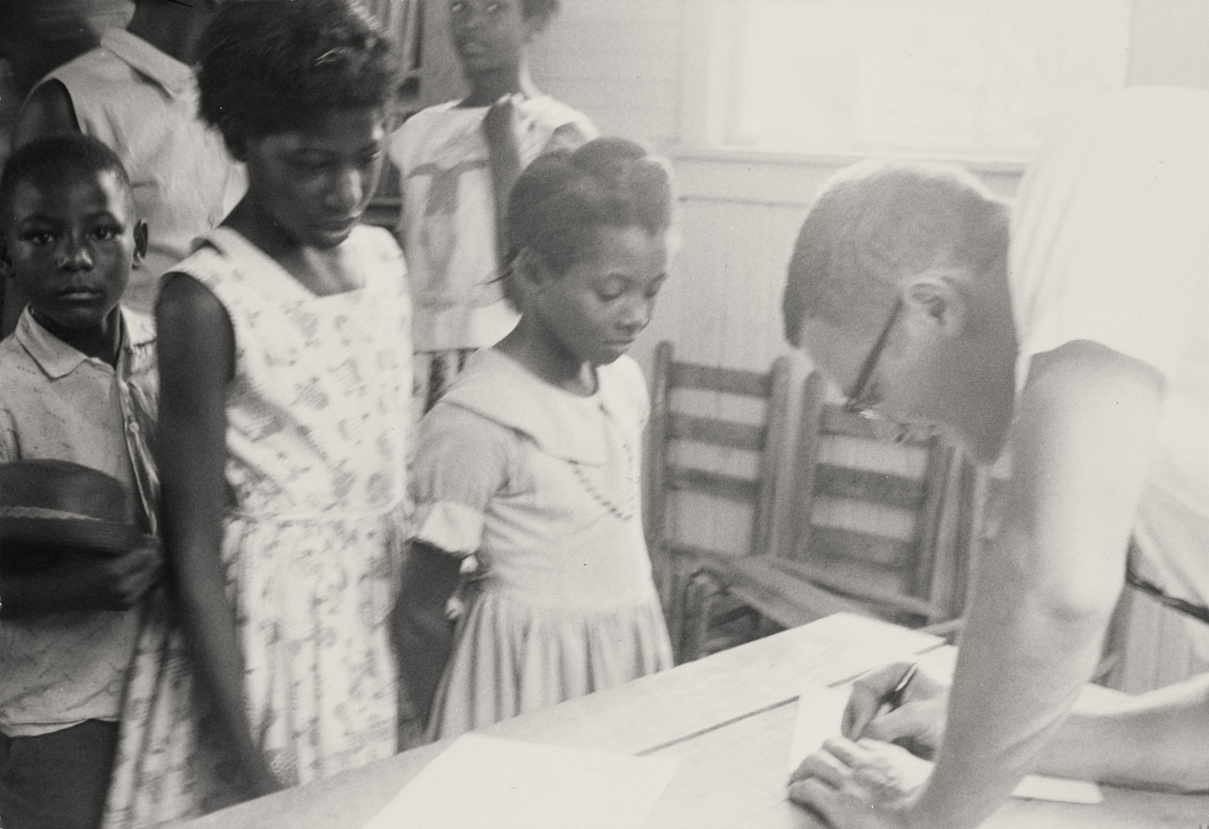 Children Registering for Freedom School, 1964. Photograph by Carol Gross Colca.